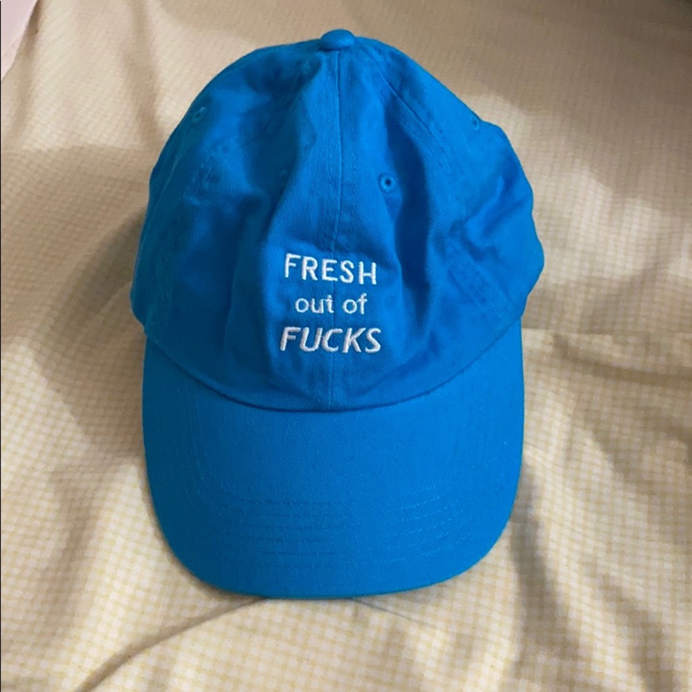Baby blue strapback cap.